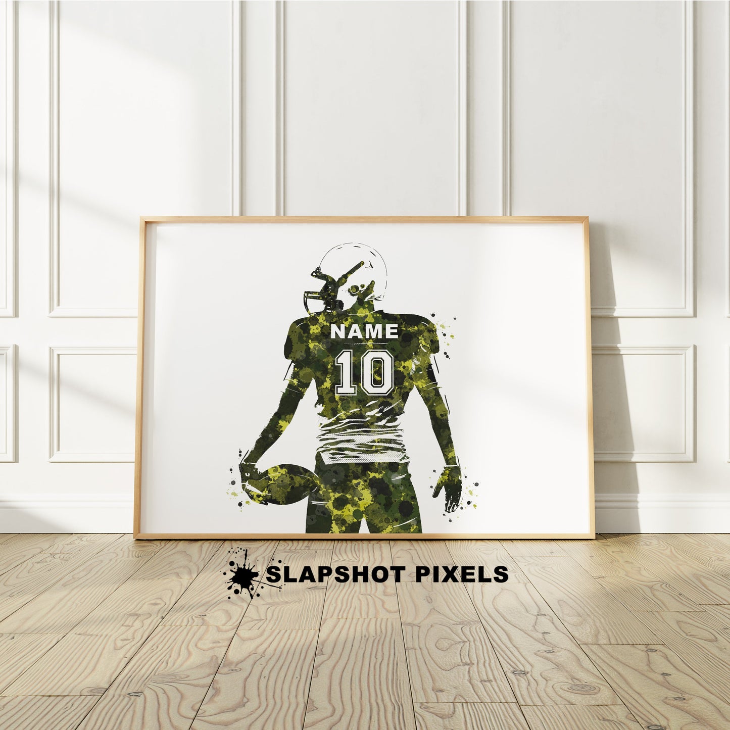 Personalized boy football poster showing back of a football player from the waist up holding a football with custom name and number on the football jersey. Designed in watercolor splatters. Perfect football gifts for boys, football goalie prints, football team gifts, football coach gift, football wall art décor in a football bedroom and birthday gifts for football players.