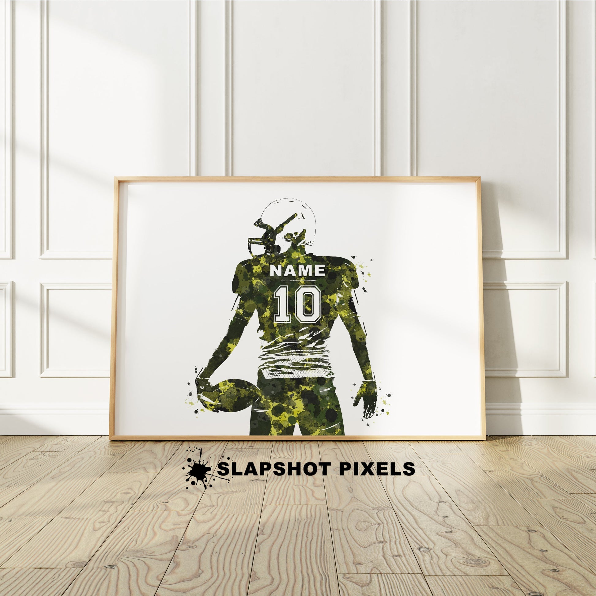 Personalized boy football poster showing back of a football player from the waist up holding a football with custom name and number on the football jersey. Designed in watercolor splatters. Perfect football gifts for boys, football goalie prints, football team gifts, football coach gift, football wall art décor in a football bedroom and birthday gifts for football players.