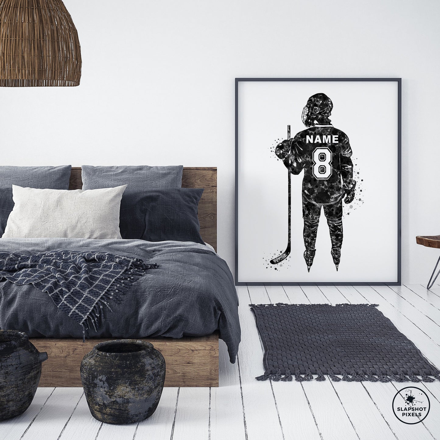 Personalized hockey poster showing back of hockey player with custom name and number on the hockey jersey. Designed in watercolor splatters. Perfect hockey gifts for boys, hockey team gifts, hockey coach gift, hockey wall art décor in a hockey bedroom and birthday gifts for hockey players.