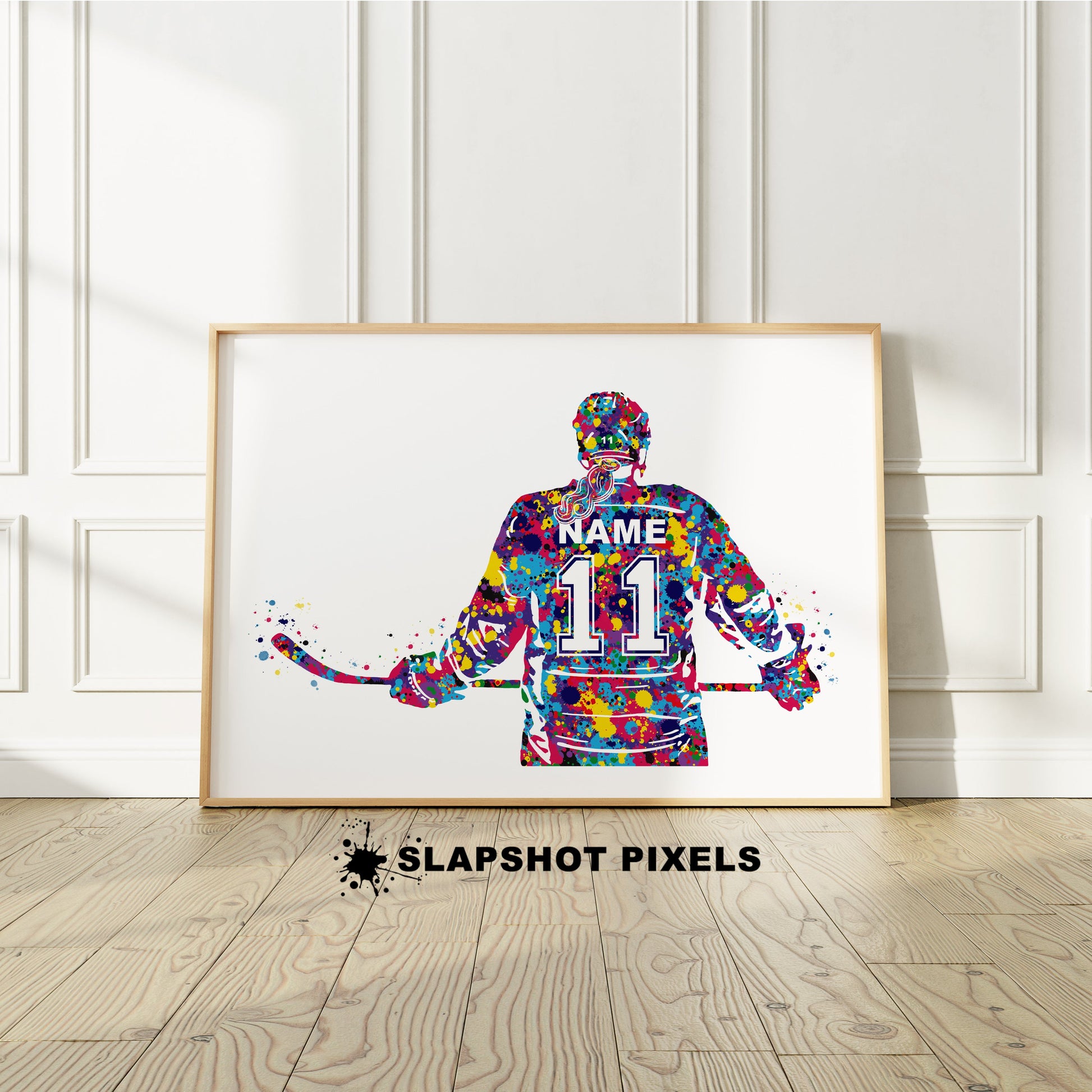 Personalized hockey poster showing back of a girl hockey player with custom name and number on the hockey jersey. Designed in watercolor splatters. Perfect hockey gifts for girls, hockey team gifts, hockey coach gift, hockey wall art décor in a hockey bedroom and birthday gifts for hockey players.