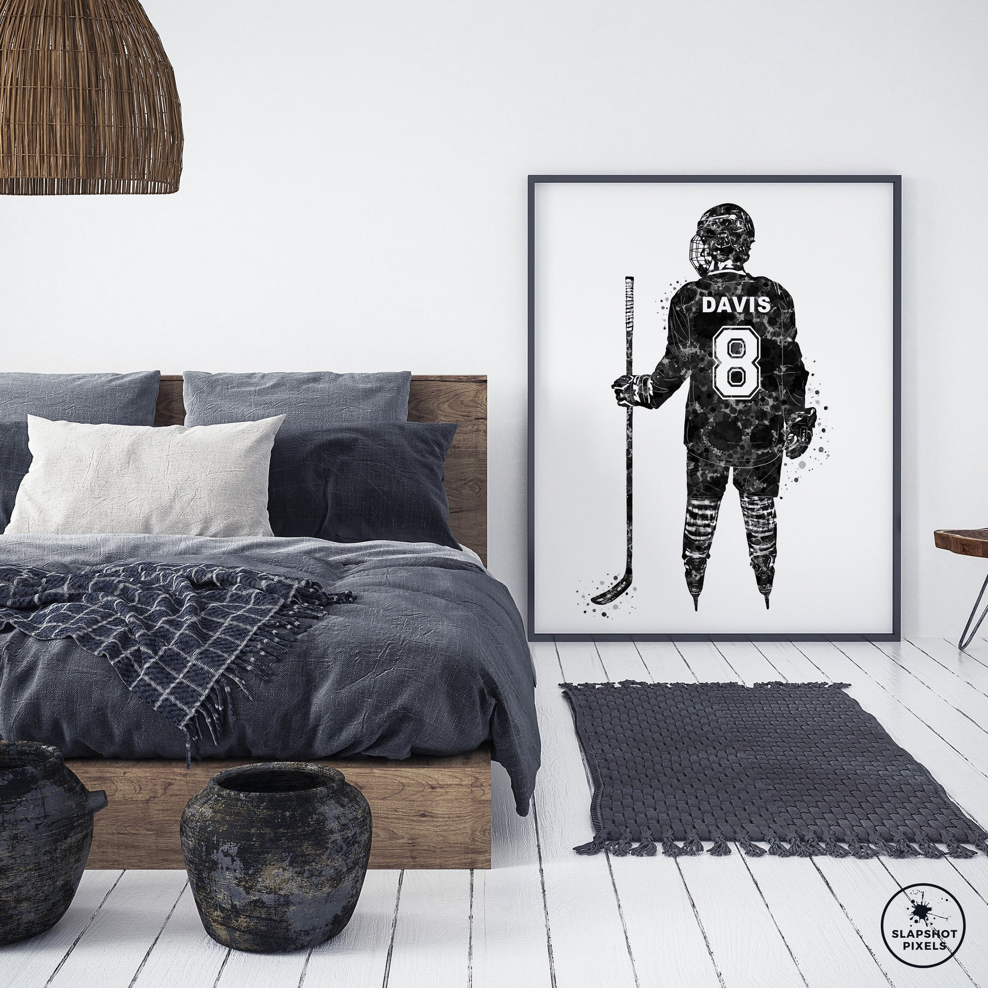 Personalized hockey poster showing back of hockey player with custom name and number on the hockey jersey. Designed in watercolor splatters. Perfect hockey gifts for boys, hockey team gifts, hockey coach gift, hockey wall art décor in a hockey bedroom and birthday gifts for hockey players.