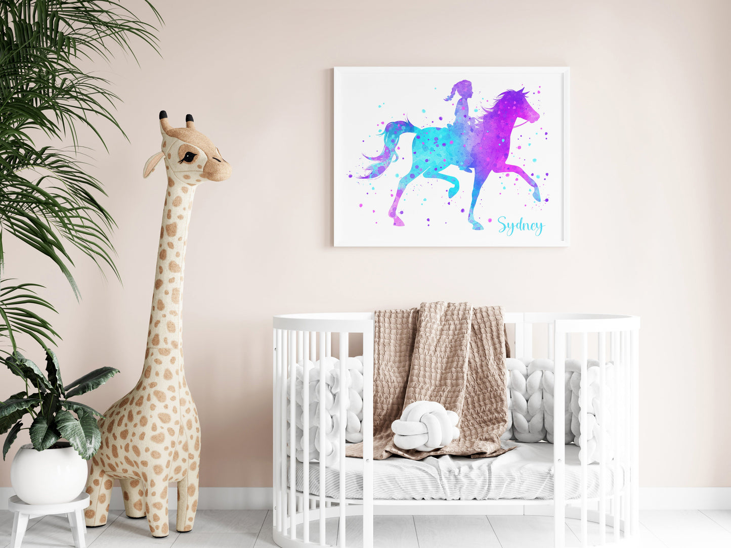 Personalized horseback riding poster showing a girl riding a horse with a custom name. Designed in pink, purple and teal watercolor splatters. Perfect horseback riding gifts for girls, horse prints, horseback riding wall art décor in a girls bedroom and birthday gifts for girls.