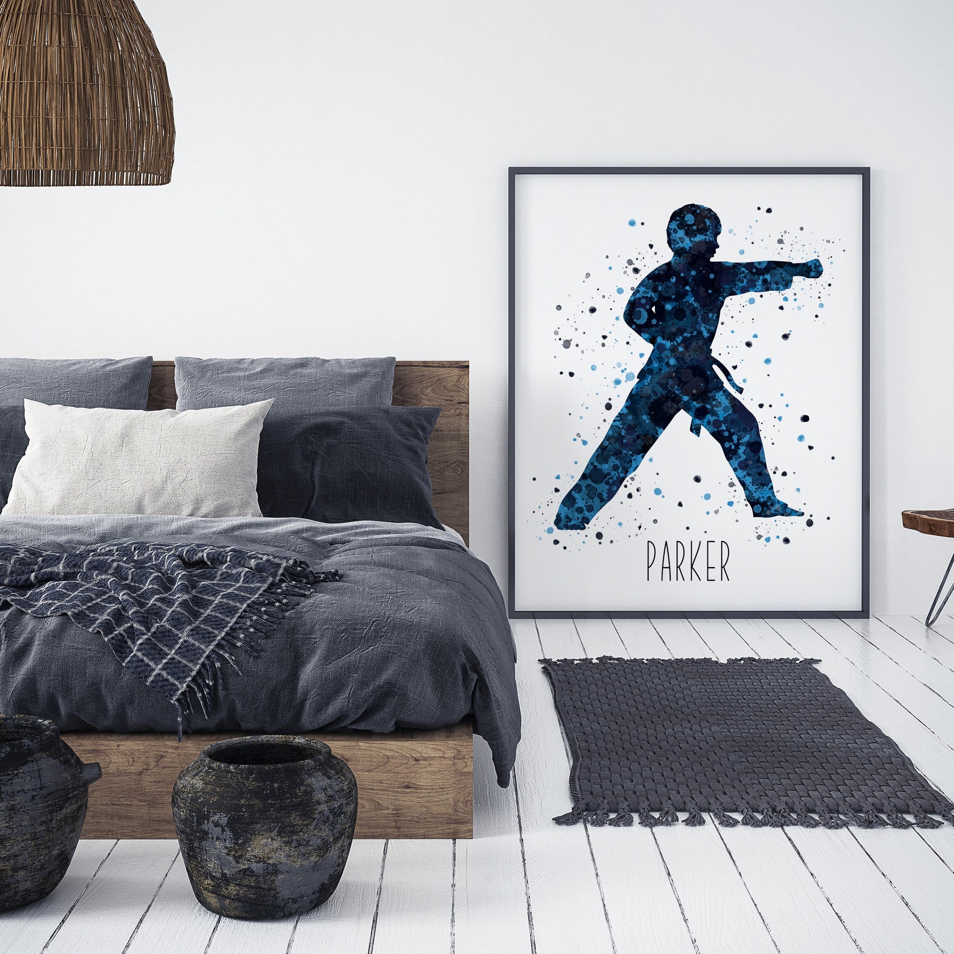 Personalized karate poster showing boy in a punch stance with name under the karate boy. Designed in watercolor splatters. Perfect karate gifts for boys, karate and judo prints, martial arts gifts, tae kwon do gifts, karate wall art décor in a karate bedroom and birthday gifts for karate boys.