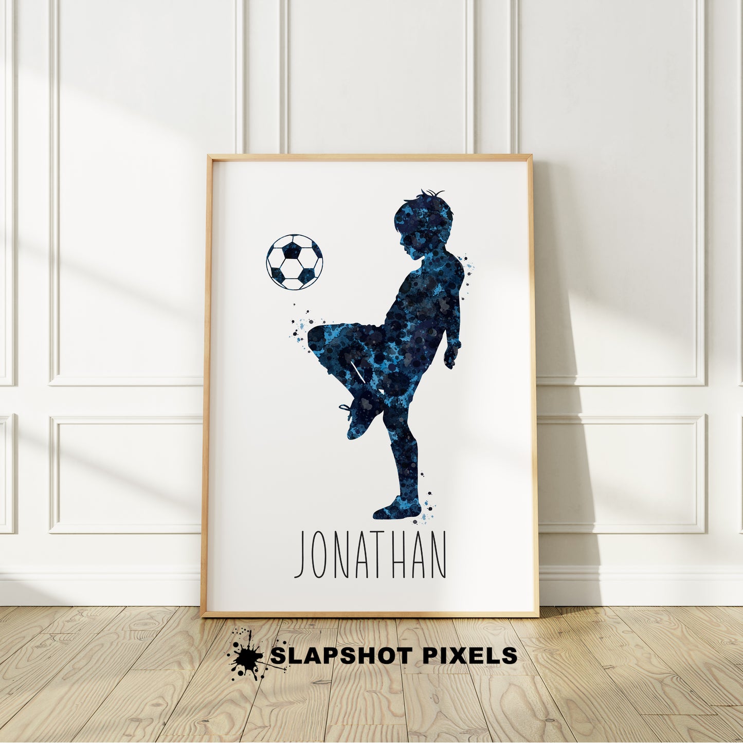Personalized soccer poster showing little boy soccer player bouncing soccer ball on his knee with custom name under player. Designed in yellow and black watercolor splatters. Perfect soccer gifts for boys, soccer team gifts, soccer coach gift, soccer wall art décor, football prints and soccer bedroom.